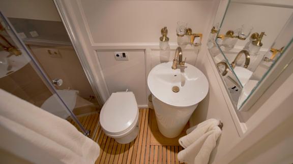 The bathroom on Liberte 11 features modern design and stylish details, providing a comfortable space.